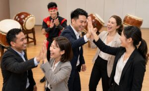 お祭りリズムで盛り上がる多国籍企業チーム
